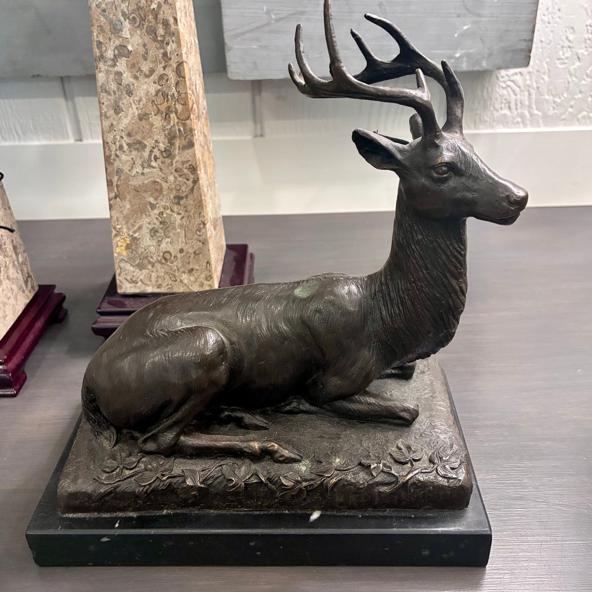 Bronze Model of a Recumbant Stag, signed P. Lecourtier