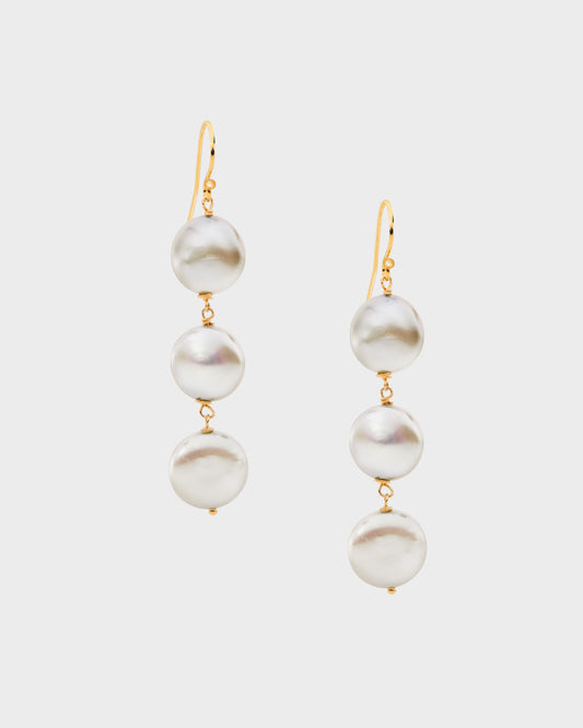 Three tier white freshwater pearl earrings with a 14k gold filled post