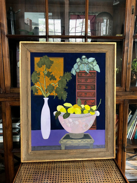 A BOWL OF CITRUS FRUIT